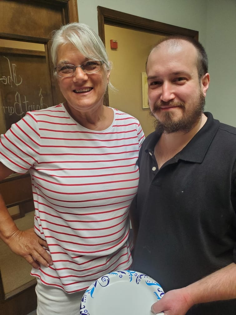 Cindy of Solley United Church and Jason standing together and smiling